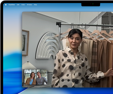 A video call on a MacBook Pro where a woman shows fabrics to two people on the call, with Centre Stage keeping her centred in the frame as she moves around